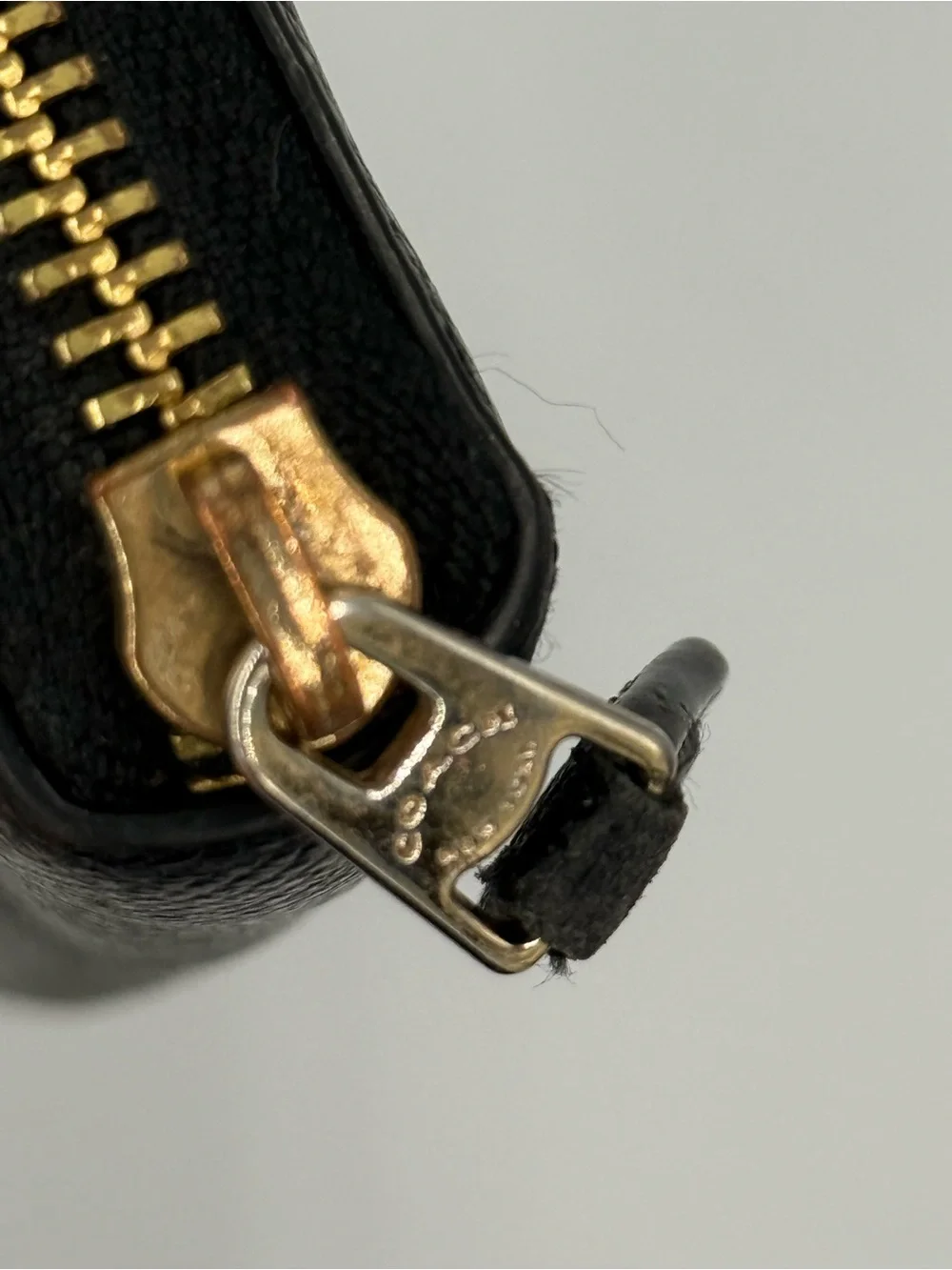 Coach Black Zip-Around Saffiano Leather Wallet with Gold Logo
